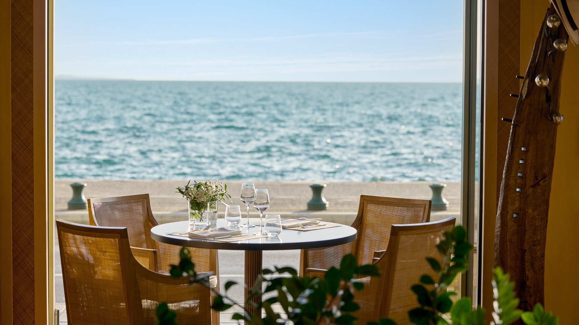 A dining table of Daios Bar Restaurant with sea view